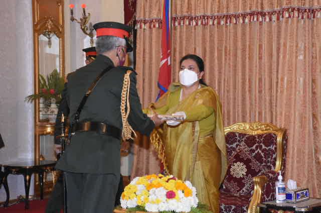 President Bidya Devi Bhandari conferring the Honorary General of the Nepali Army title to General MM Navarane, amid a ceremony at Shital Niwas, in Kathmandu, on Thursday, November 5, 2020. Photo Courtesy: Indian Embassy in Nepal