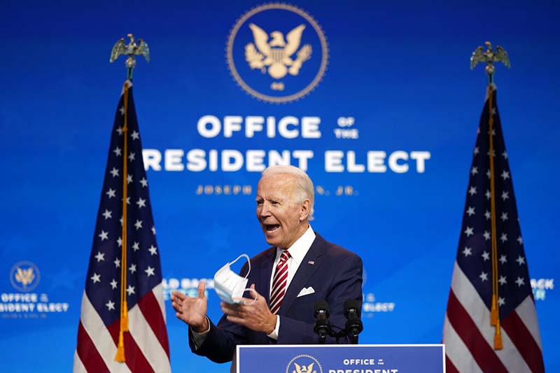 President-elect Joe Biden, accompanied by Vice President-elect Kamala Harris, speaks about economic recovery at The Queen theater, on Monday, November 16, 2020, in Wilmington, Delaware. Photo: AP