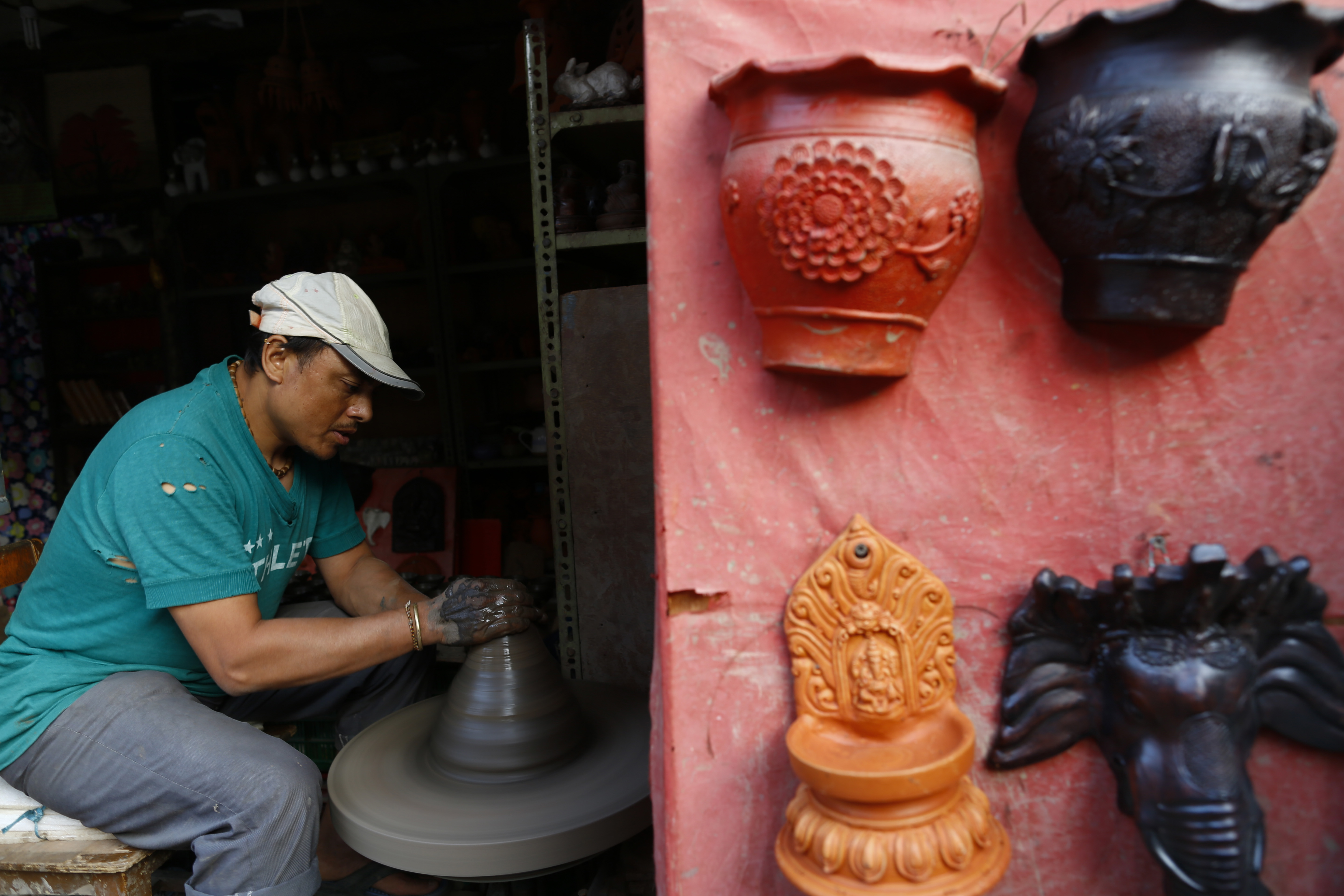 A potter crafts earthen lamps to sell in the markets for Tihar festival, in Bhaktapur, on Wednesday, November 04, 2020. Photo: Skanda Gautam/THT