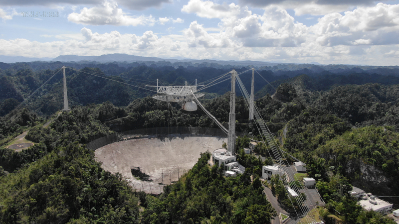 The Arecibo Observatory space telescope, which was damaged in August and in November from broken cables which tore holes in the structure, is seen in Arecibo, Puerto Rico November 7, 2020. Photo: UCF/Handout via Reuters