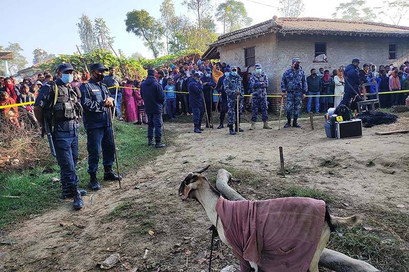 Police personnel at the incident site cordoned off for investigation in Laukaha village, Madhavnarayan Municipality-5, Rautahat district, on Thursday, November 12, 2020. A divorced teenage girl was shot dead at her parent's home. Photo: Prabhat Kumar Jha/THT