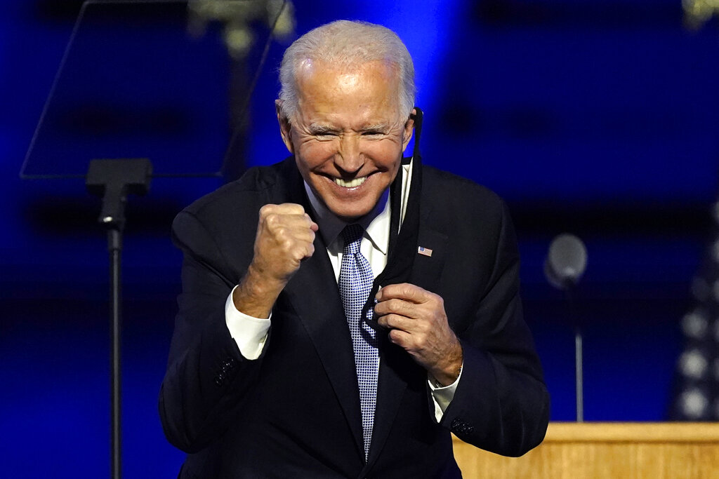 US President-elect Joe Biden gestures to supporters, in Wilmington, Delaware, on Saturday, November 7, 2020. Photo: AP