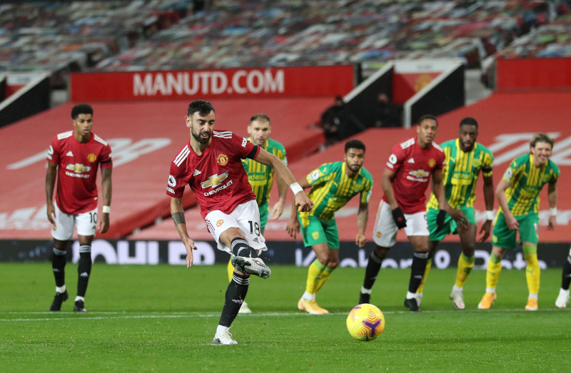 Manchester United's Bruno Fernandes misses a penalty kick which is then retaken n during the Premier League match between Manchester United and West Bromwich Albion, at  Old Trafford, in  Manchester, Britain, on November 21, 2020. Photo:  Pool via Reuters