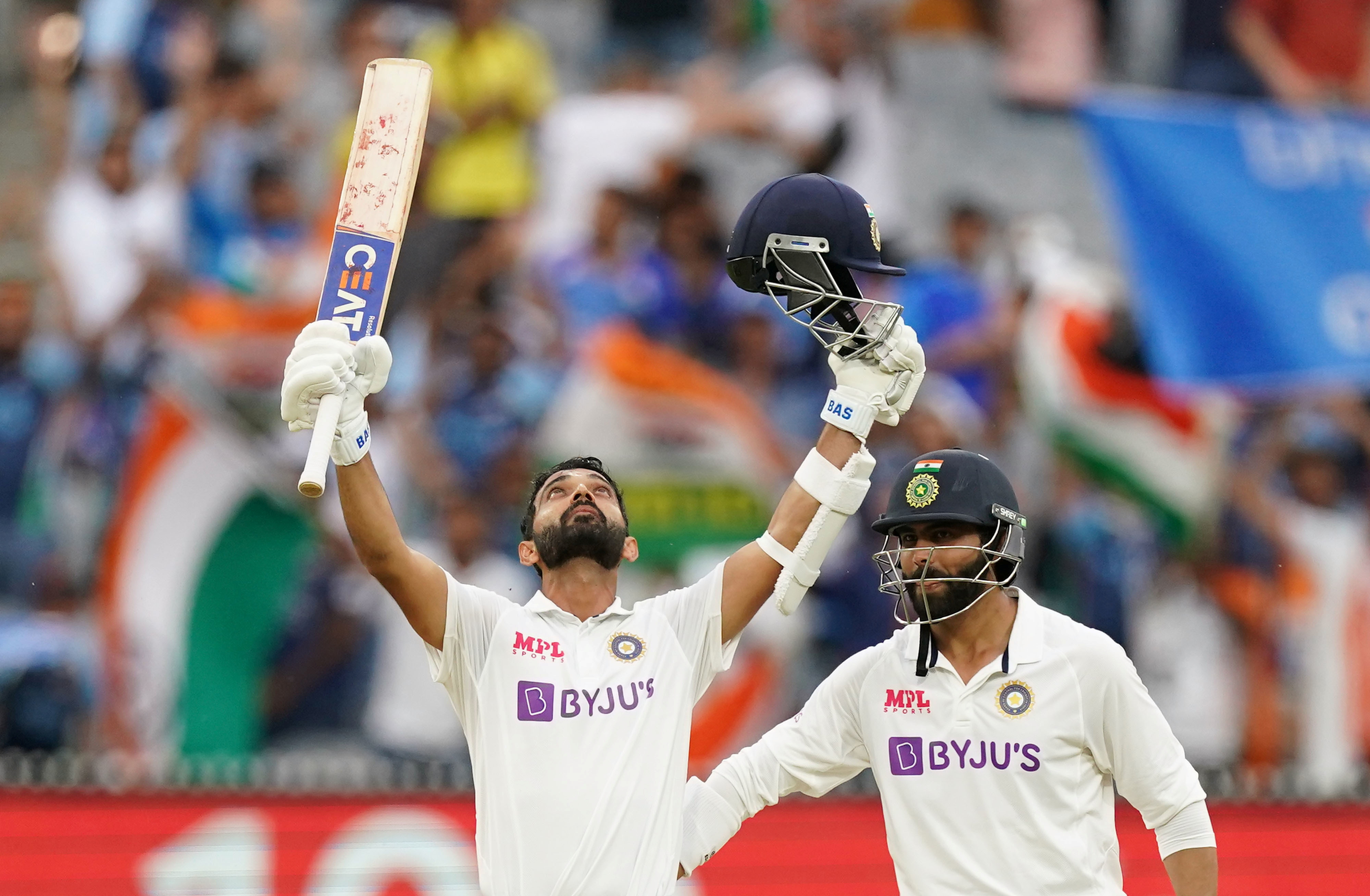 India's Ajinkya Rahane celebrates after reaching his century as his teammate Ravindra Jadeja looks on during day two of the second test match between Australia and India at The MCG, Melbourne, Australia, December 27, 2020. Photo: Reuters