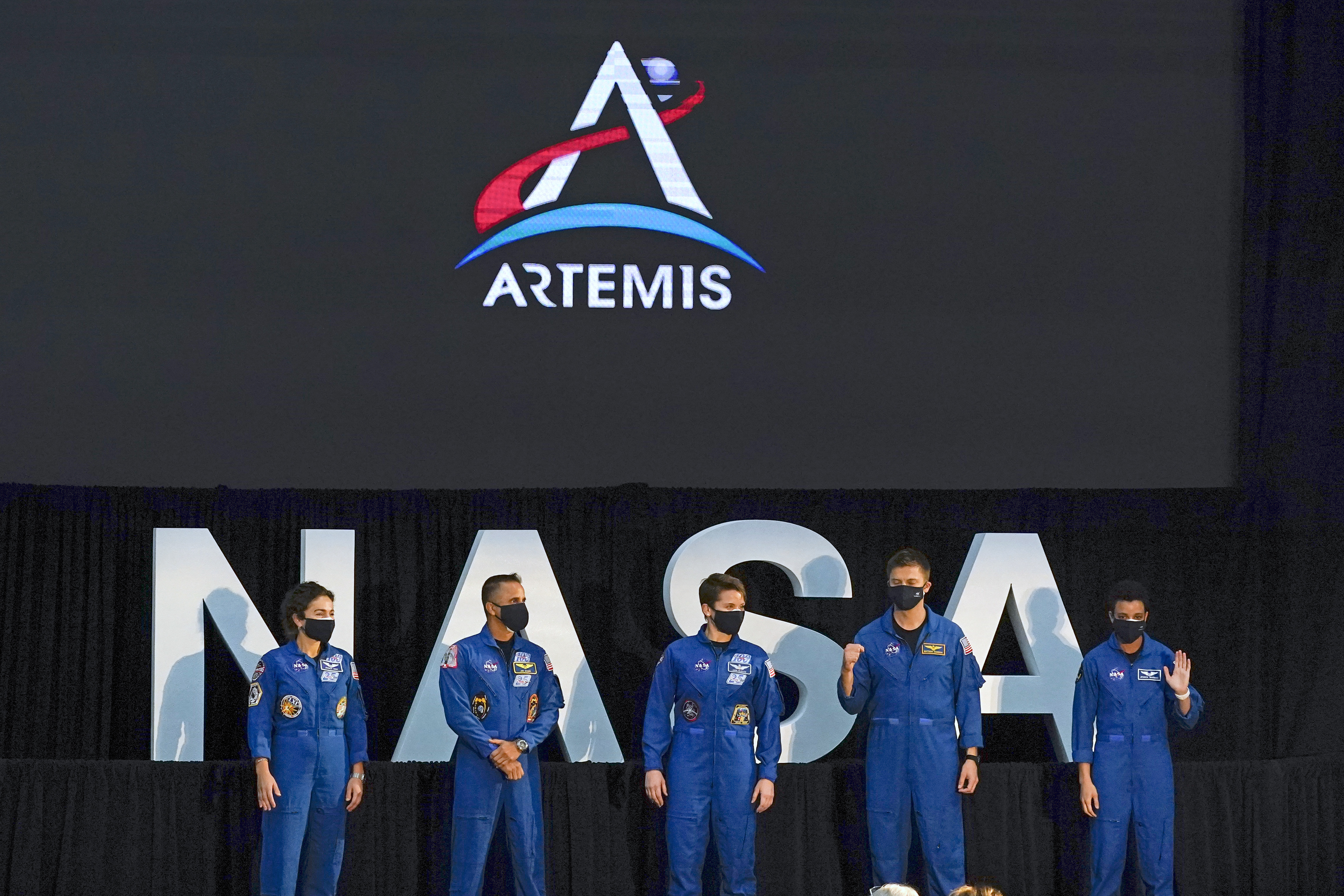Five of the astronauts that will be part of the Atremis missions, from left, Jessica Meir, Joe Acaba, Anne McClain, Matthew Dominick, and Jessica Watkins are introduced by Vice President Mike Pence during the eighth meeting of the National Space Council at the Kennedy Space Center Wednesday, Dec. 9, 2020, in Cape Canaveral , Fla. Photo: AP