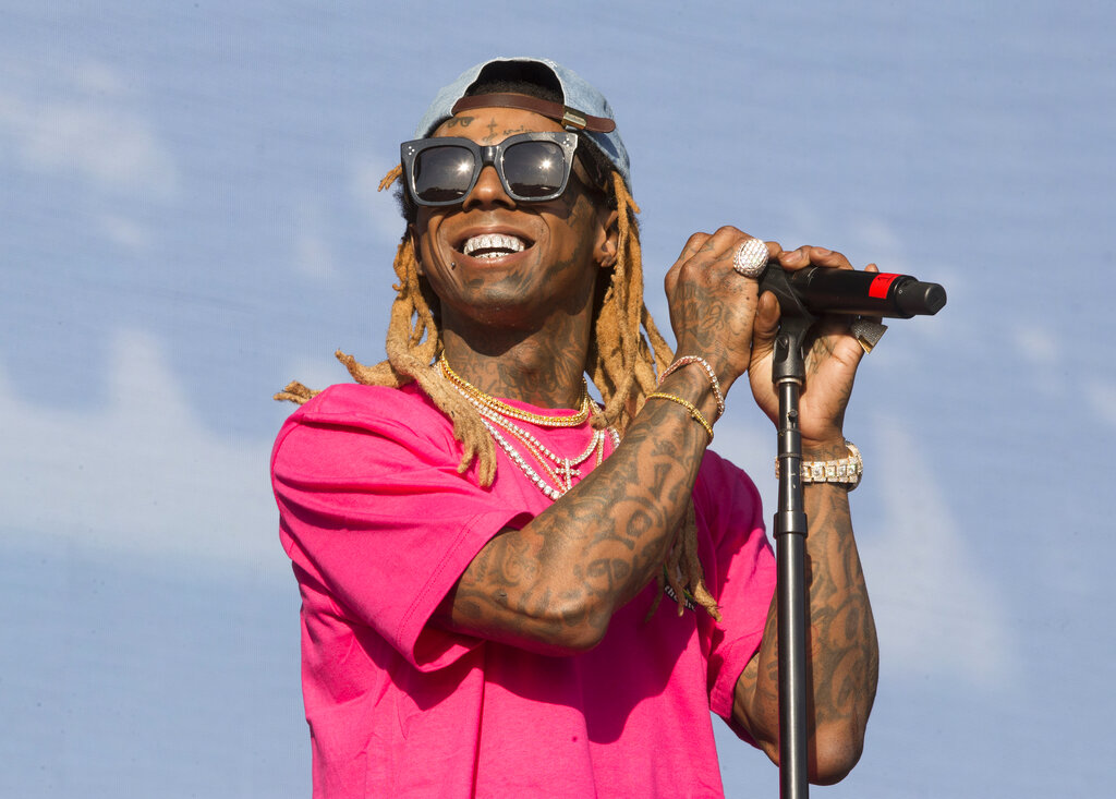 In this Saturday, June 16, 2018 file photo, Lil Wayne performs on Day 3 of the 2018 Firefly Music Festival at The Woodlands in Dover, Del. Rapper Lil Wayne has pleaded guilty, Friday, December 11, 2020 to a federal charge that he possessed a weapon despite being a convicted felon following a 2019 search of a private plane in the Miami area. Photo: AP