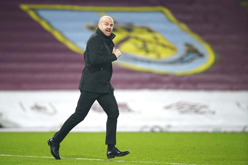 Burnley manager Sean Dyche runs to the touchline before the second half during the English Premier League soccer match between Burnley and Sheffield United at the Turf Moor stadium in Burnley, England, on Tuesday, December 29, 2020. Photo: Dave Thompson/Pool via AP