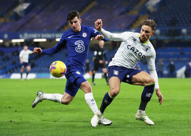 Chelsea's Mason Mount in action with Aston Villa's Matty Cash during the Premier League match between Chelsea and Aston Villa, at Stamford Bridge, in London, Britain, on December 28, 2020. Photo: Pool via Reuters