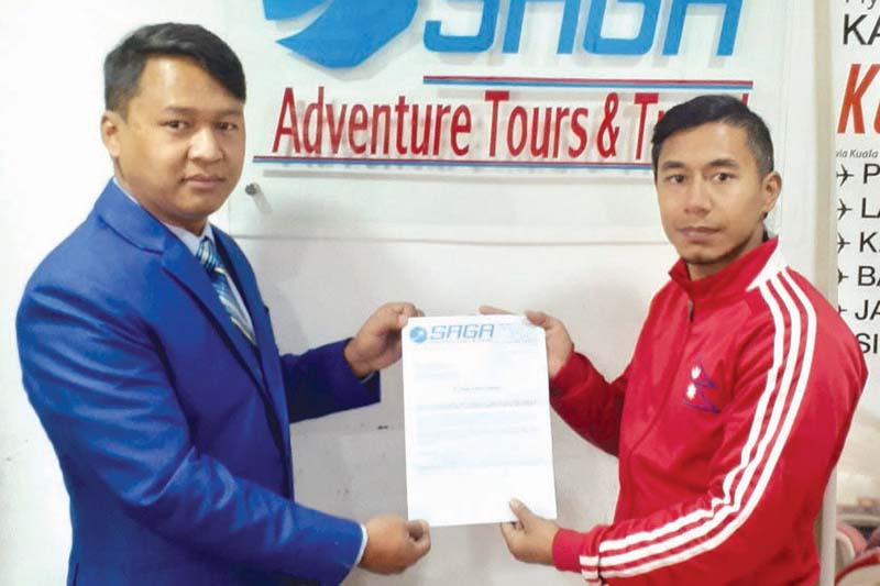 Saga Tours and Travel Pvt Ltd signs karateka Suman Timalsina as its brand ambassador, in Kathmandu, on Wednesday, December 30, 2020. Photo: THT