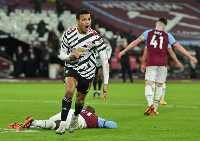 Manchester United's Mason Greenwood celebrates scoring their second goal  during the Premier League match between West Ham United and Manchester United, at London Stadium, in London, Britain, on December 5, 2020. Photo: Pool via Reuters
