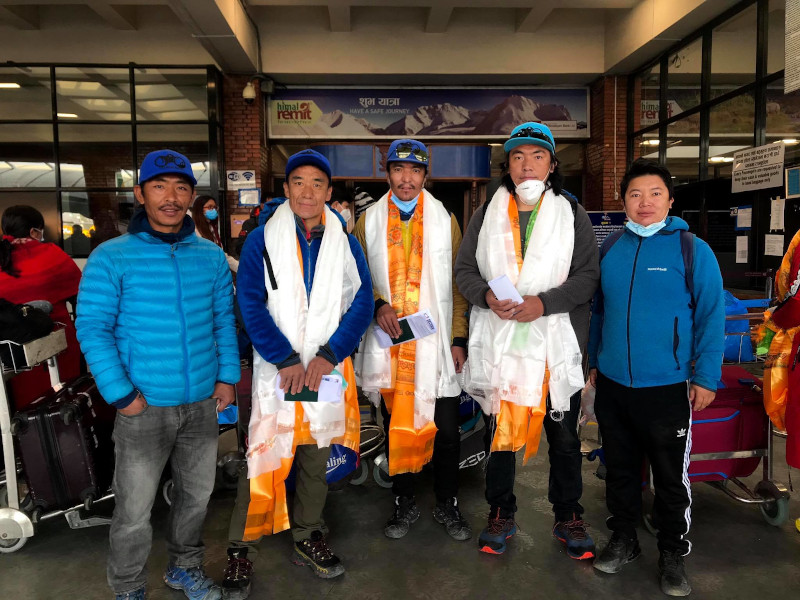Nepali team attempting to climb the worldu2019s second highest peak this season aiming to be the first to make a successful winter ascent of K2 pose for a photograph. 
