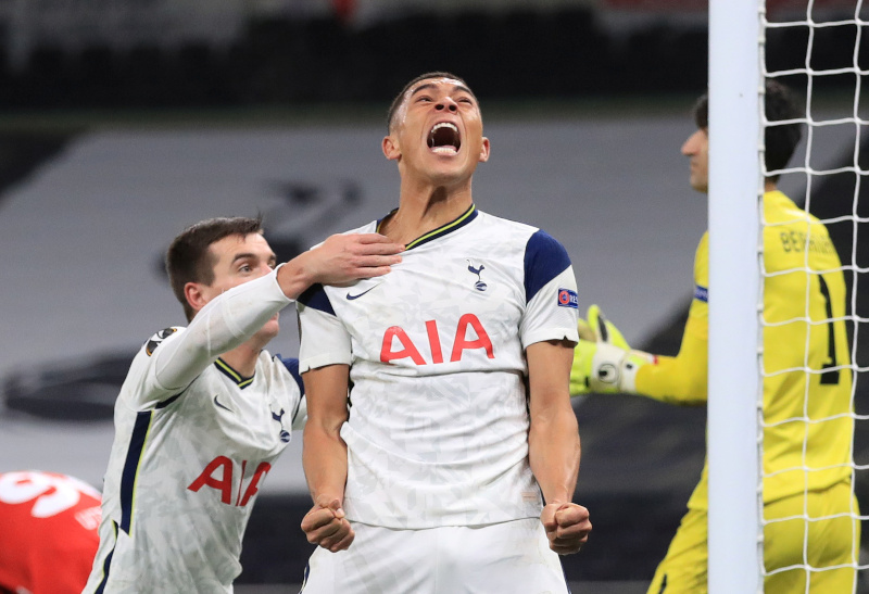 Tottenham Hotspur's Carlos Vinicius celebrates scoring their first goal with Giovani Lo Celso during the Europa League Group J match  between Tottenham Hotspur and Royal Antwerp, at Tottenham Hotspur Stadium, in London, Britain, on December 10, 2020. Photo: Pool via Reuters