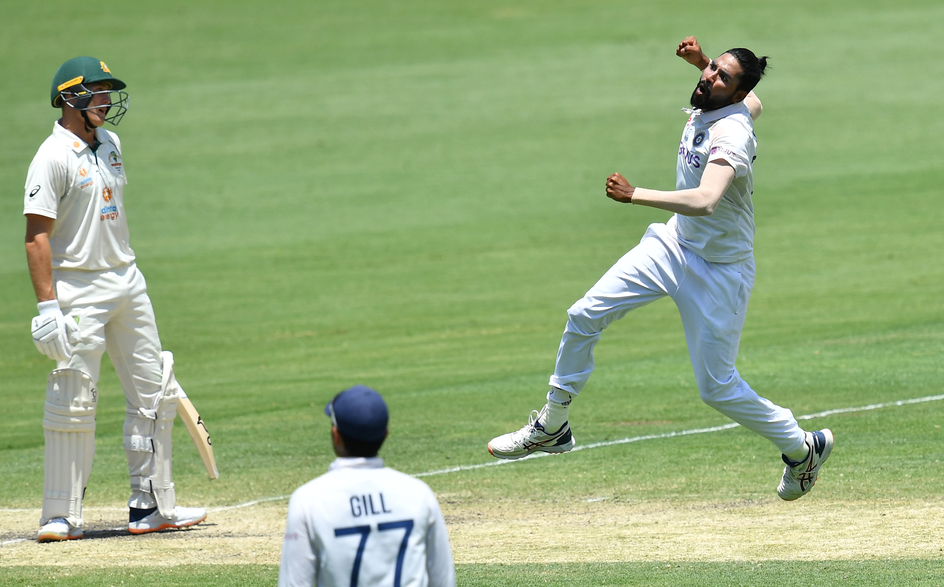 Mohammed Siraj of India celebrates the wicket of Marnus Labuschagne of Australia during day four of the fourth test match between Australia and India at the Gabba in Brisbane, Australia, January 18, 2021. Photo: Reuters