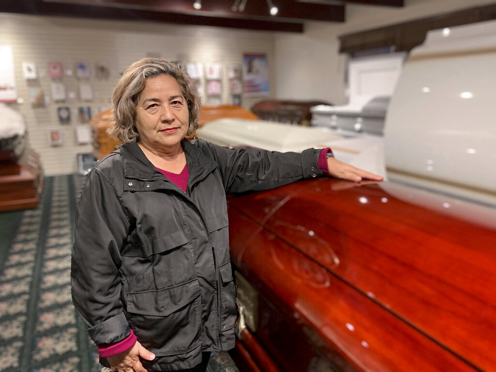 Magda Maldonado, owner of Continental Funeral Home in Los Angeles, poses in her mortuary on December 30, 2020. Southern California funeral homes are turning away bereaved families because they're running out of space for all the bodies piling up during an unrelenting coronavirus surge that has sent COVID-19 death rates to new highs. Photo: AP