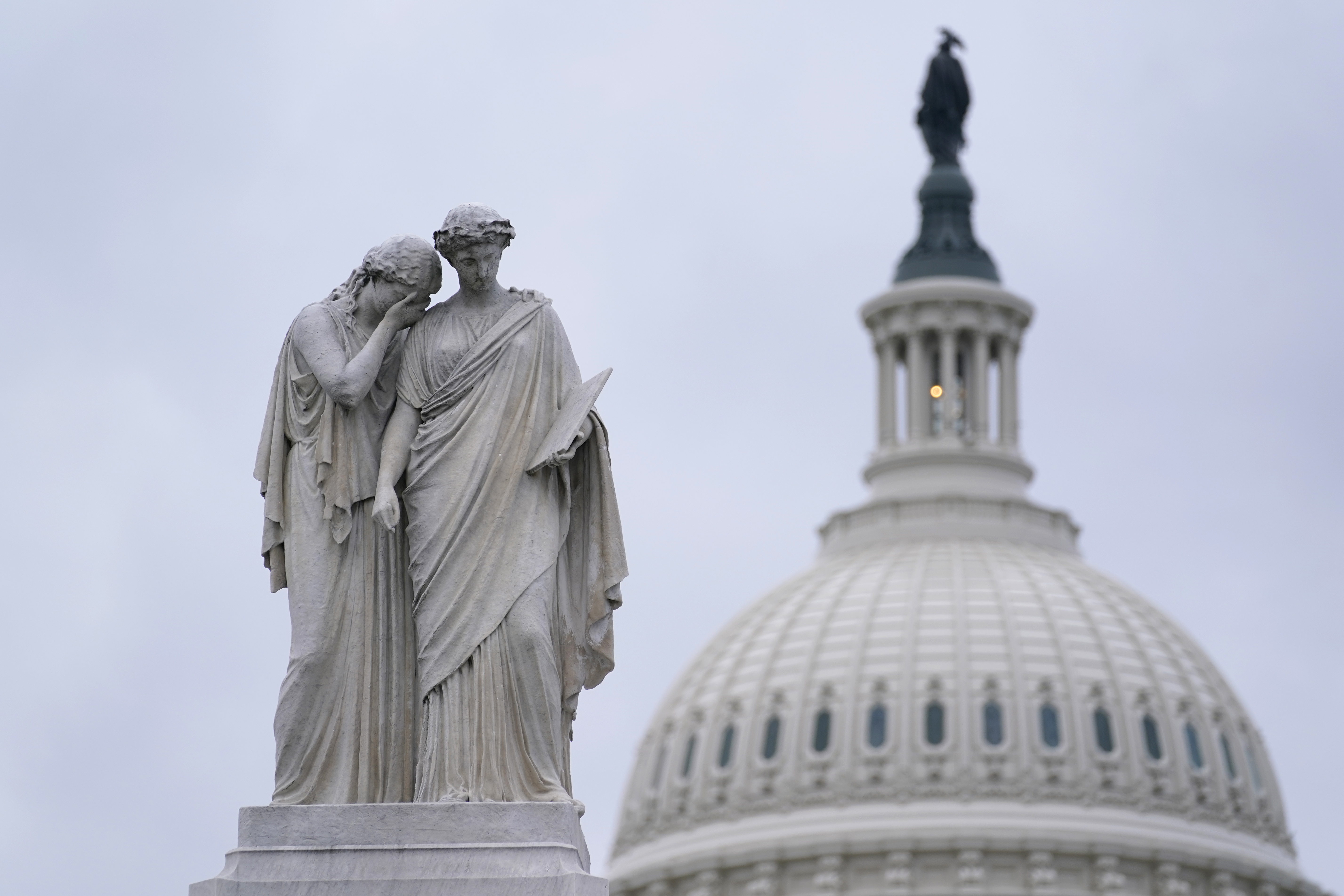 The Peace Monument, also known as the Naval Monument or Civil War Sailors Monument, is framed by the Capitol dome on Capitol Hill in Washington, Monday, Jan. 4, 2021. Wednesdayu2019s congressional joint session to count electoral votes could drag late into the night as some Republicans plan to challenge Democrat Joe Bidenu2019s victory in at least six states.  Photo: AP