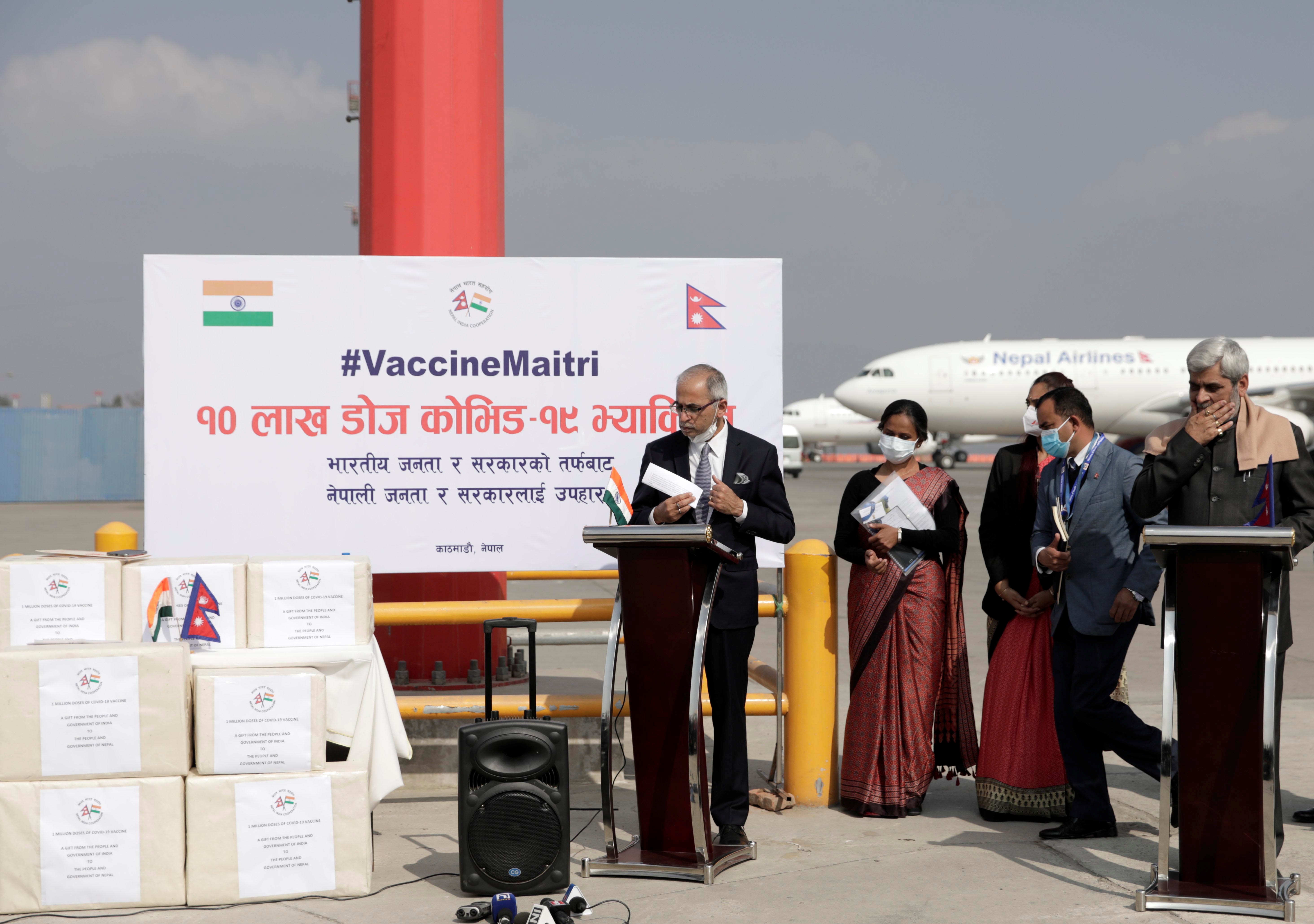 Nepal's Minister for Health and Population Hridayesh Tripathi and Indian ambassador to Nepal Vinay Mohan Kwatra attend the vaccine handover ceremony upon the arrival of the first batch of COVID-19 vaccines provided by the Government of India as a grant to Nepal, at Tribhuvan International Airport in Kathmandu, on Thursday, January 21, 2021. Photo: Reuters 