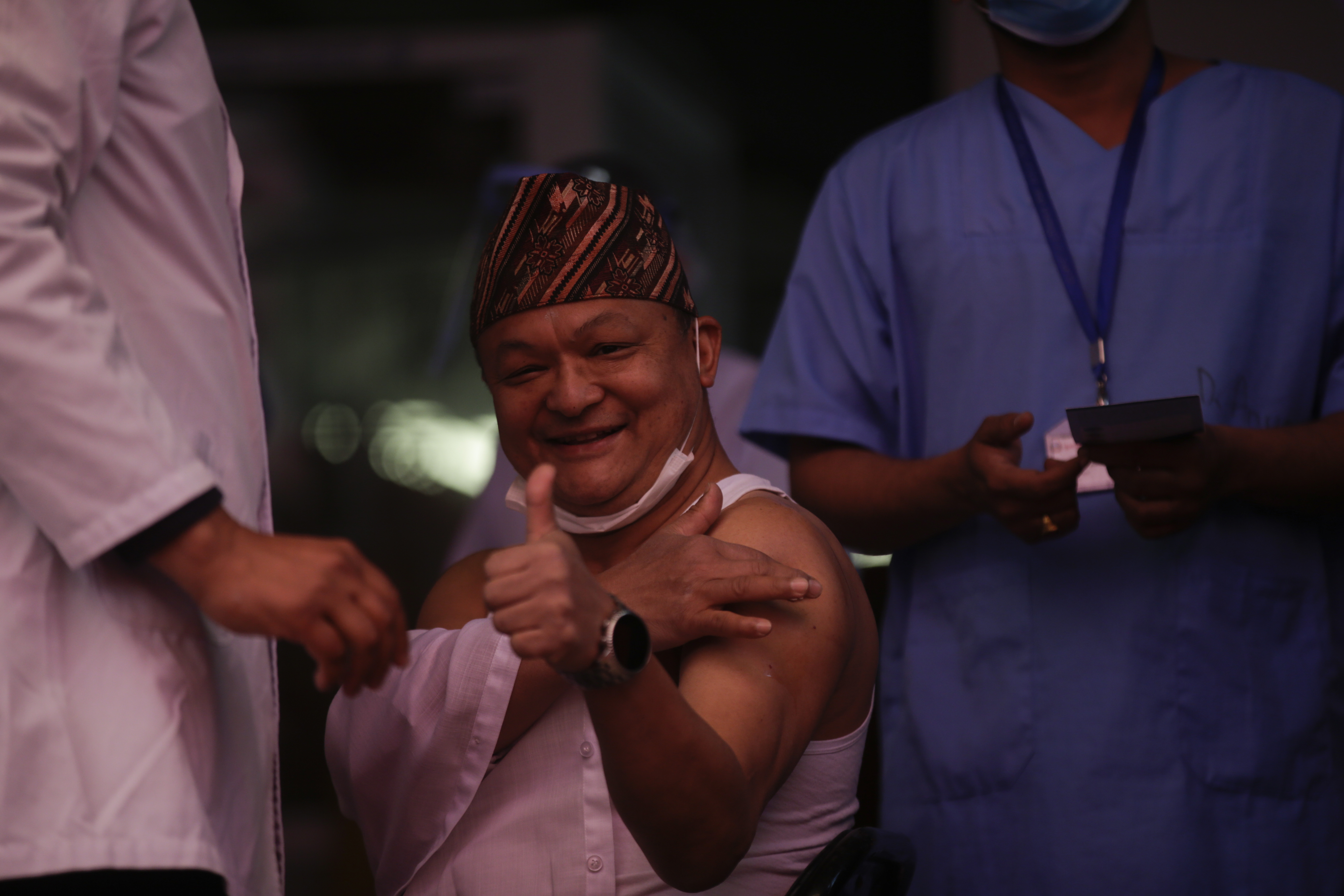 Director of Shukraraj Tropical and Infectious Disease Hospital, Dr Sagar Rajbhandari, receives the first jab of Covid-19 vaccine at the hospital, on Wednesday, January 27, 2021. Photo: Skanda Gautam/THT