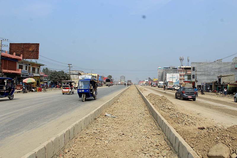 Vehicles are seen plying the under-construction six-lane Mohana Bridge-Attariya road in Kailali district. Photo: Tekendra Deuba/THT