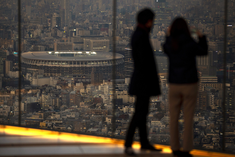 Japan National Stadium, where opening ceremony and many other events are planned for postponed Tokyo 2020 Olympics, is seen from a rooftop observation deck Thursday, Jan. 21, 2021, in Tokyo. Photo: AP