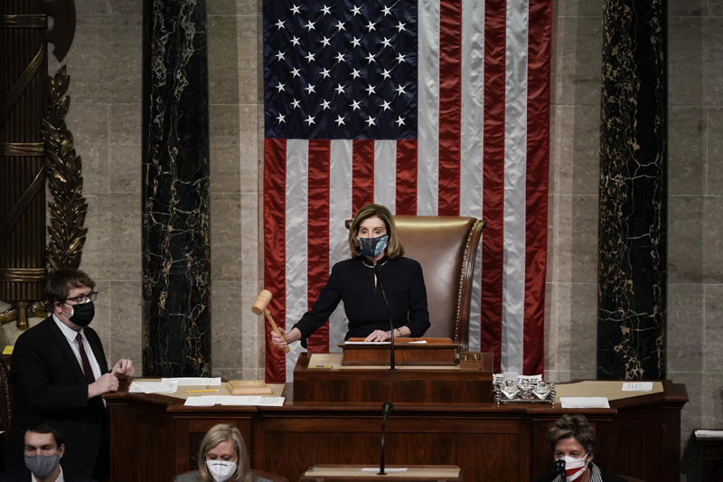 Speaker of the House Nancy Pelosi, D-Calif., leads the final vote of the impeachment of President Donald Trump, for his role in inciting an angry mob to storm the Congress last week, at the Capitol in Washington, Wednesday, Jan. 13, 2021. Photo: AP