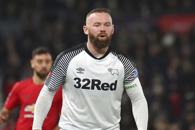 FILE - Derby's Wayne Rooney looks on, during the FA Cup fifth round soccer match between Derby County and Manchester United at Pride Park in Derby, England, on Thursday, March 5, 2020 . Photo: AP