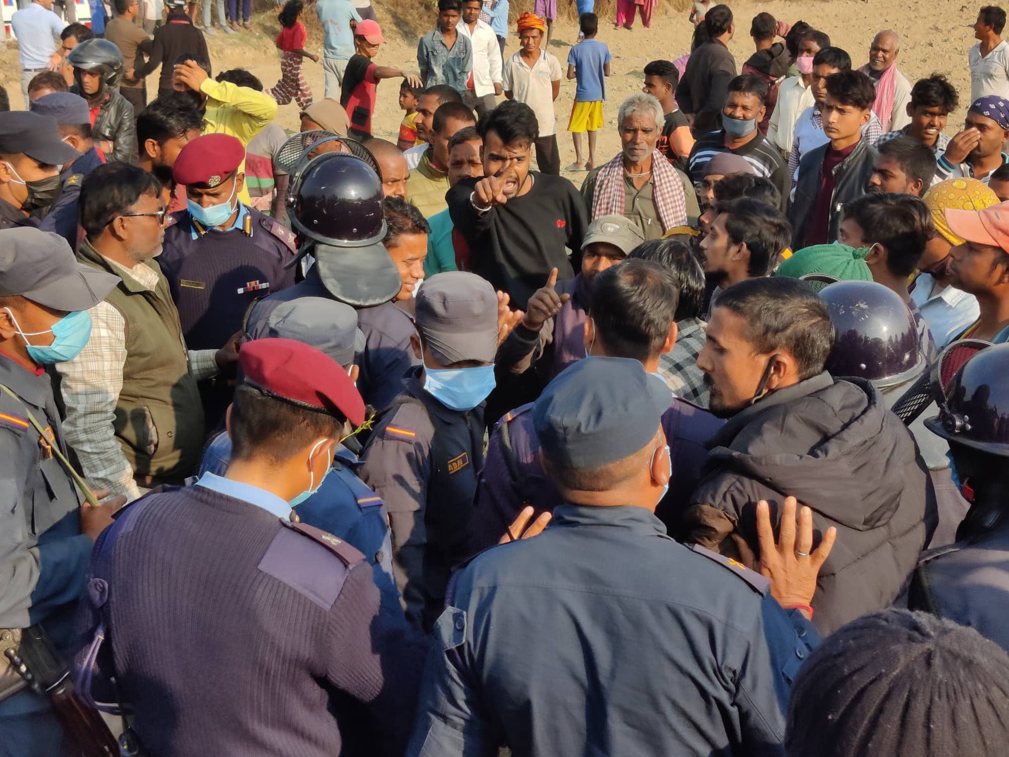 Locals gather around the crime scene in Siraha district, on Wednesday, January 06, 2020. Photo: Aashish BK/THT
