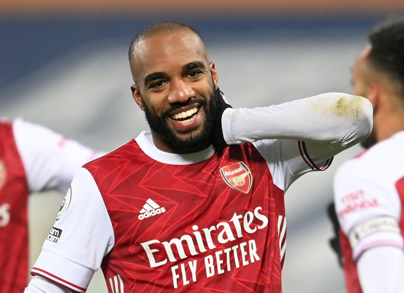 Arsenal's Alexandre Lacazette celebrates scoring their third goal during the Premier League match between West Bromwich Albion and Arsenal, at The Hawthorns, in West Bromwich, Britain, on January 2, 2021. Photo: Pool via Reuters