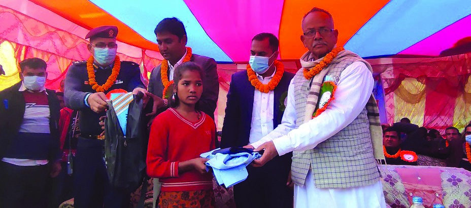 A student receiving school uniform at a programme in Rautahat, on Monday. Photo: THT